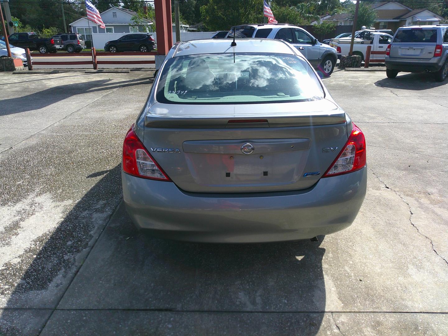 2014 GRAY NISSAN VERSA S; SL; SV (3N1CN7AP0EL) , located at 1200 Cassat Avenue, Jacksonville, FL, 32205, (904) 695-1885, 30.302404, -81.731033 - Photo#3